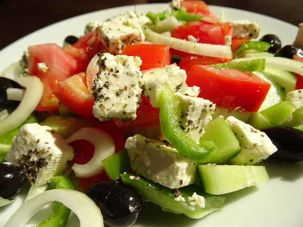 Greek Salad with Feta Cheese, Tomatoes, Cucumbers, Peppers,  Oli