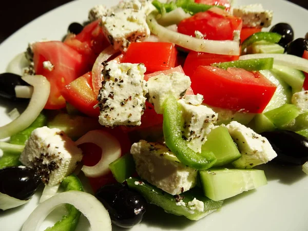 Greek Salad with Feta Cheese, Tomatoes, Cucumbers, Peppers,  Oli