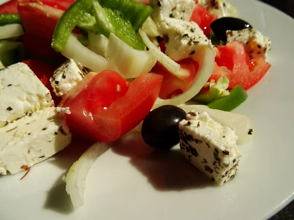 Greek Salad with Feta Cheese, Tomatoes, Cucumbers, Peppers,  Oli