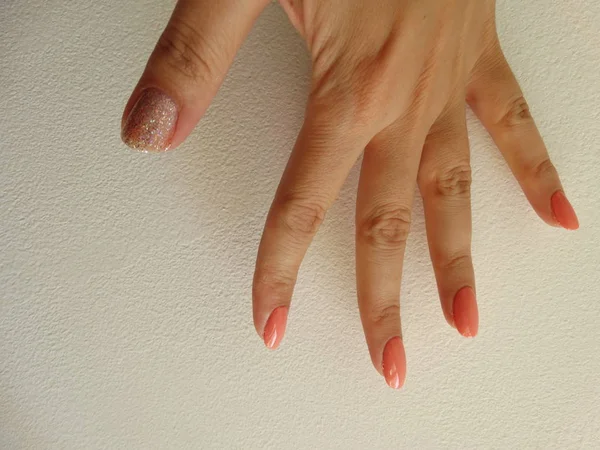 Coral Color Nail Polish with Glitter