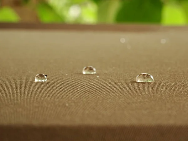 Round Water & Waterscapes Drops on Brown Cloth