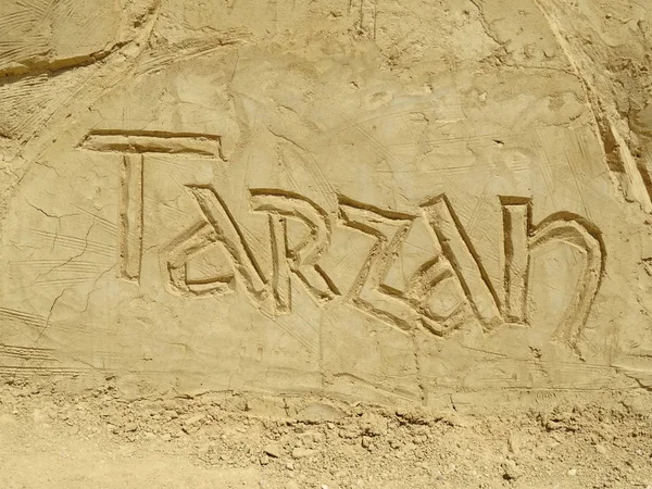 Sandskulptur Aus Tarzan Bildunterschrift — Stockfoto