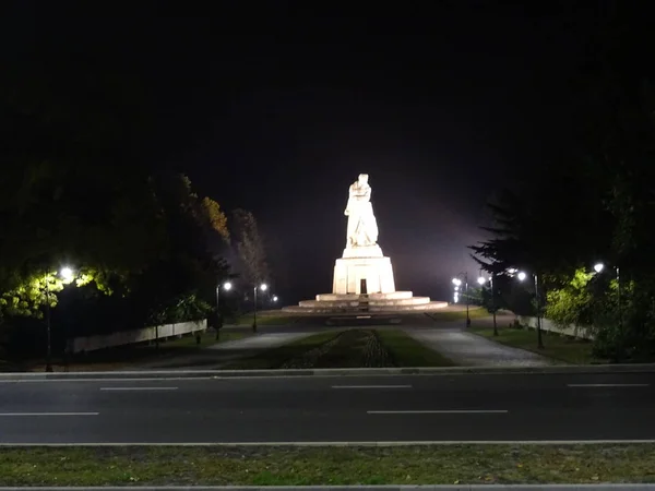 A statue in Varna Sea Garden at Night