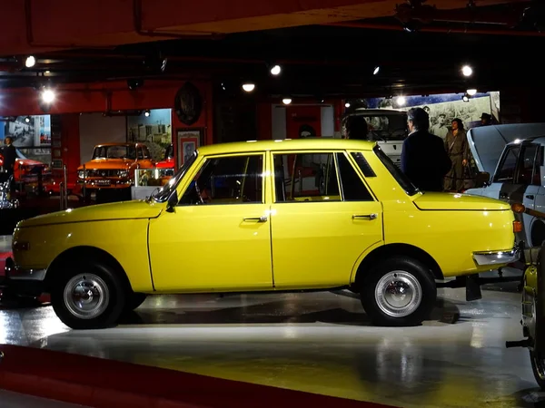 Yellow Retro Car in a Museum