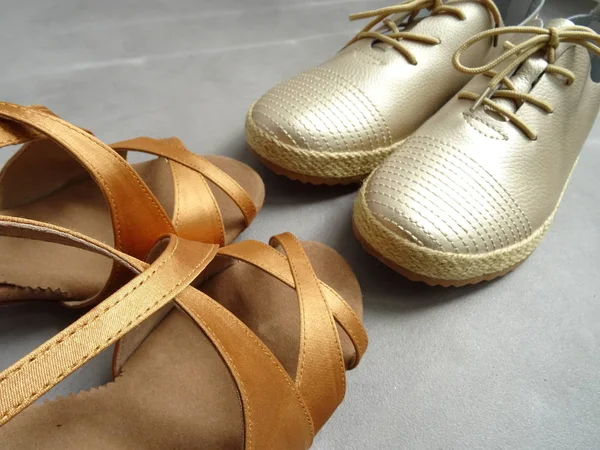 Golden Male and Female Dance Shoes