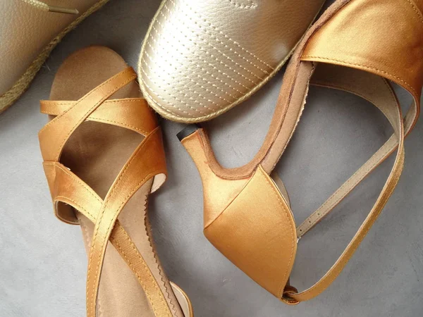 Golden Male and Female Dance Shoes