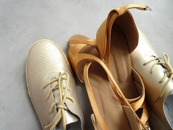 Golden Male and Female Dance Shoes