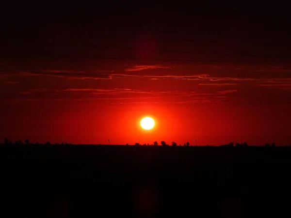 Coucher de soleil rouge ciel — Photo