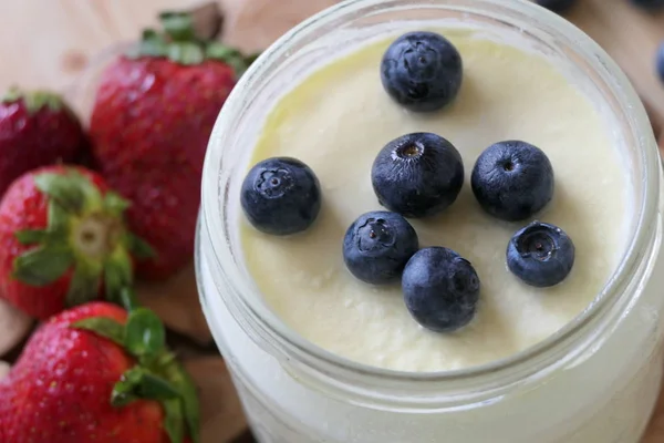 Homemade Yoghurt in a Jar with Fresh Strawberries and Blueberrie — Stock Photo, Image