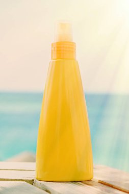 Sahilde - Cilt Bakımı kozmetik ve tatil tasarımlı kavram güneş tan losyon