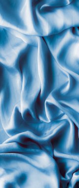 Mavi yumuşak ipek dalgalar, flatlay - şık kumaş dokular, arka ve modern pastel renklerle kavramı. Lüks dokunuş hissediyorum