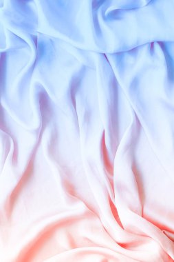 Neon yumuşak ipek dalgalar, flatlay - şık kumaş dokular, arka ve modern pastel renklerle kavramı. Zamansız lüks hissetmeye