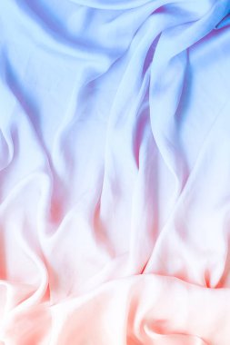 Neon yumuşak ipek dalgalar, flatlay - şık kumaş dokular, arka ve modern pastel renklerle kavramı. Zamansız lüks hissetmeye