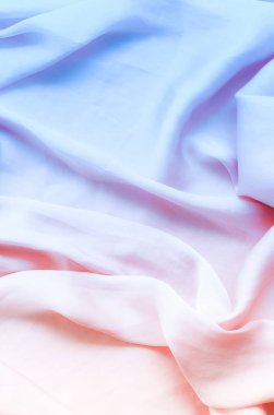 Neon yumuşak ipek dalgalar, flatlay - şık kumaş dokular, arka ve modern pastel renklerle kavramı. Zamansız lüks hissetmeye