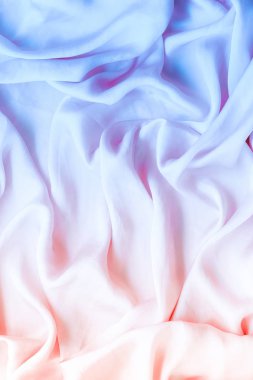 Neon yumuşak ipek dalgalar, flatlay - şık kumaş dokular, arka ve modern pastel renklerle kavramı. Zamansız lüks hissetmeye