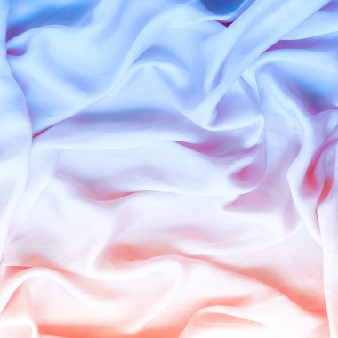 Neon yumuşak ipek dalgalar, flatlay - şık kumaş dokular, arka ve modern pastel renklerle kavramı. Zamansız lüks hissetmeye