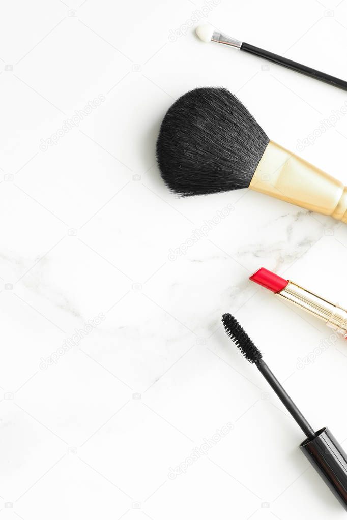 Make-up and cosmetics on marble, flatlay - modern feminine lifestyle, vlog background and styled stock concept. Beauty inspiration in a fashion blog