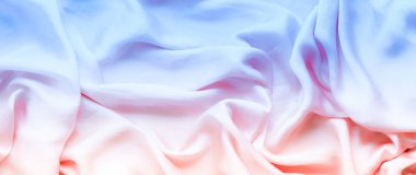 Neon yumuşak ipek dalgalar, flatlay - şık kumaş dokular, arka ve modern pastel renklerle kavramı. Zamansız lüks hissetmeye