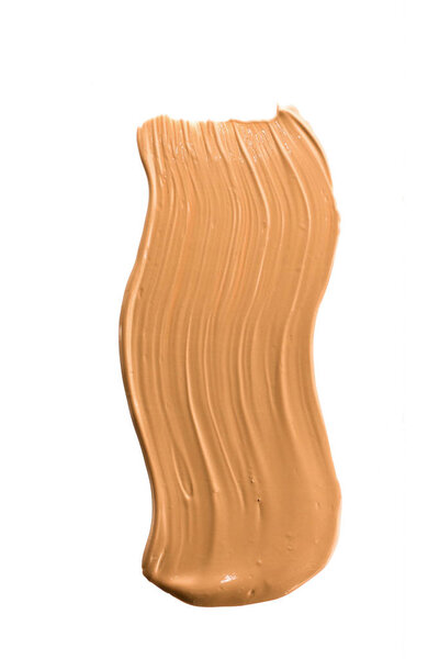 Макияж фундамент мазка мазка кисти изолированы на белом фоне, плоский - косметические продукты, красота текстуры фона концепции. Бежевый всегда хорошая идея.
