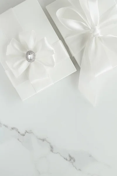 Luxury wedding gifts on marble — Stock Photo, Image