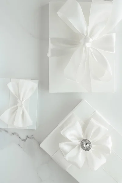 Luxury wedding gifts on marble — Stock Photo, Image