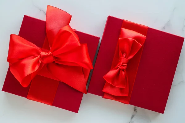 Luxury red holiday gifts on marble