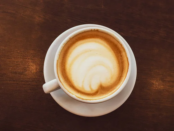Cappuccino em um restaurante, em uma pausa para café — Fotografia de Stock
