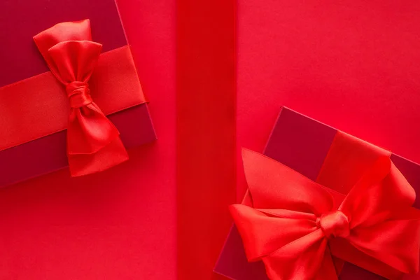 Luxury holiday gifts on red