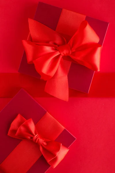 Luxury holiday gifts on red — Stock Photo, Image