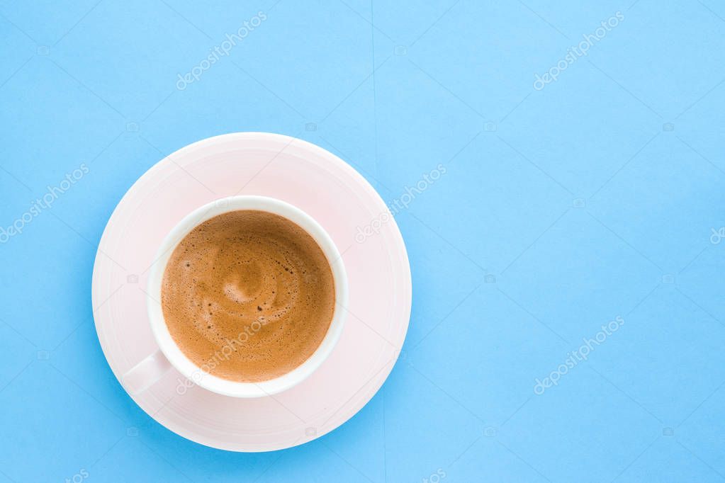 Hot aromatic coffee on blue background, flatlay