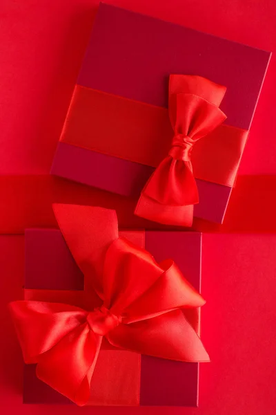 Luxury holiday gifts on red — Stock Photo, Image