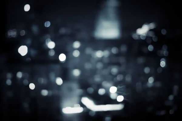 Grandes lumières de la ville métropolitaine la nuit, fond trouble — Photo