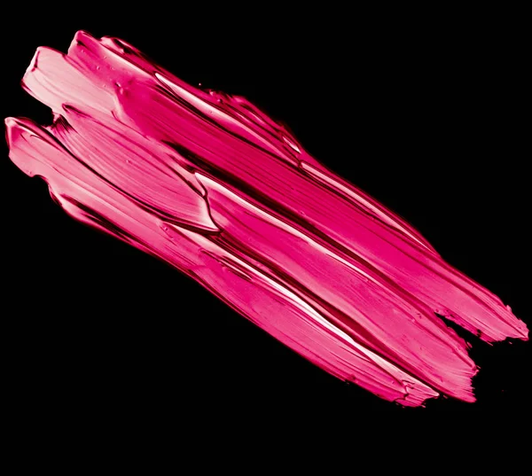 Pincel labial rosa textura del trazo aislado sobre fondo negro — Foto de Stock