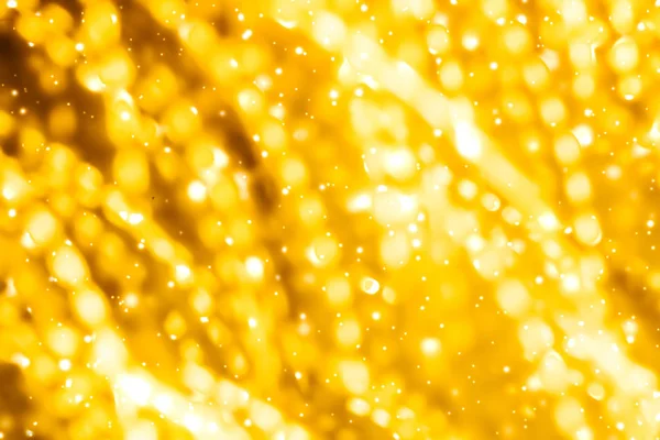 Glamoureus goud glanzend gloed en glitter, luxe vakantie achtergrond — Stockfoto