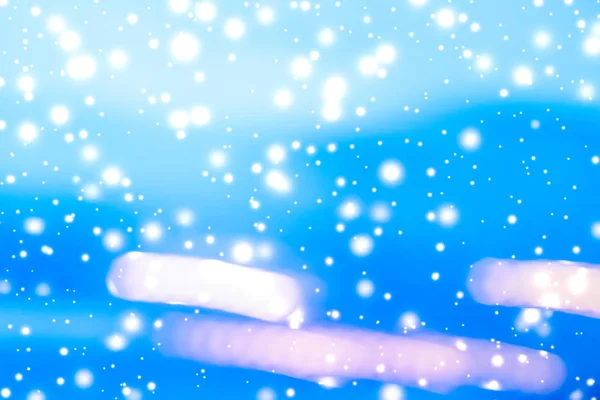 Vacanza invernale sfondo astratto, neve incandescente e scintilla magica — Foto Stock