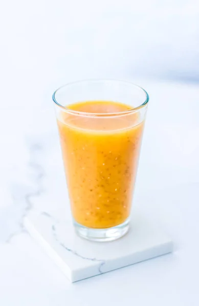 Glass of orange fruit smoothie juice with chia seeds for diet de — Stock Photo, Image