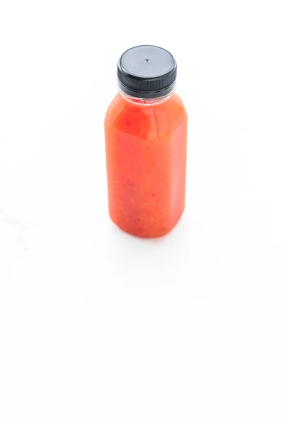 Detox red fruit smoothie juice in a bottle, diet catering delive — Stock Photo, Image