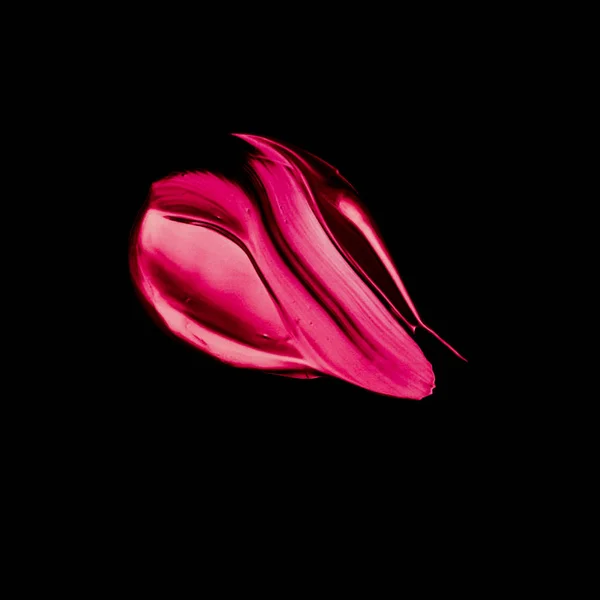 Pink lipstick brush stroke texture isolated on black background — Stock Photo, Image