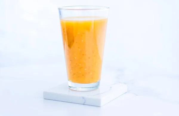 Glass of orange fruit smoothie juice with chia seeds for diet de — Stock Photo, Image