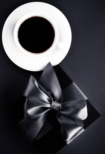 Luxury coffee brand, cup and gift box on black flatlay backgroun