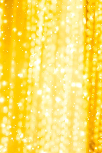 Glamoureus goud glanzend gloed en glitter, luxe vakantie achtergrond — Stockfoto