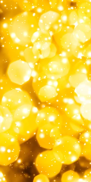 Glamoröst guld glänsande glöd och glitter, lyx semester bakgrund — Stockfoto