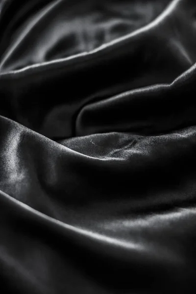 Розкішна чорна м'яка шовкова плоска текстура фону, святковий гламур — стокове фото