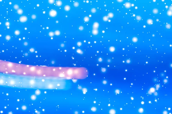 Vacaciones de invierno fondo abstracto, brillante nieve y chispa mágica — Foto de Stock