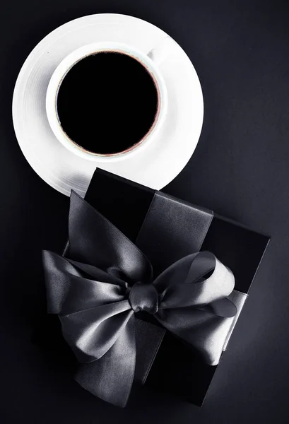 Luxury coffee brand, cup and gift box on black flatlay backgroun