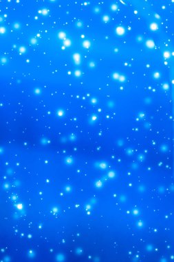 Kış tatili soyut arka plan, parlayan kar ve sihirli kıvılcım