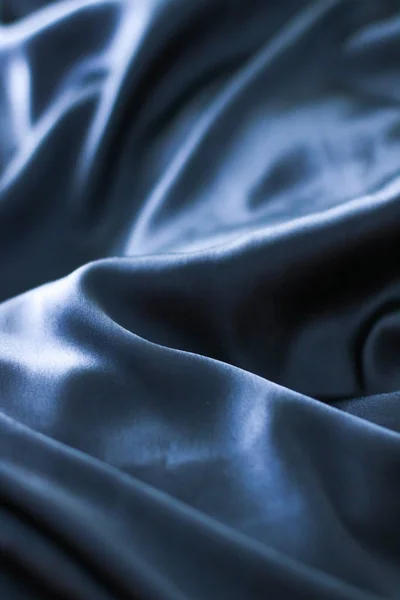 Lujo azul oscuro suave seda plana fondo textura, día de fiesta g — Foto de Stock
