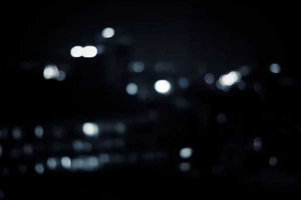 Grandes luzes da cidade metropolitana à noite, fundo embaçado — Fotografia de Stock