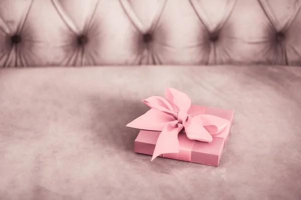 Vintage luxury holiday blush pink gift box with silk ribbon and