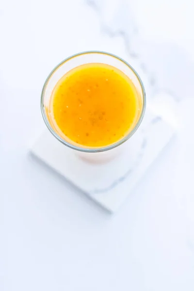 Glass of orange fruit smoothie juice with chia seeds for diet de — Stock Photo, Image